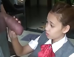 Asian schoolgirl opens wide to suck huge cock